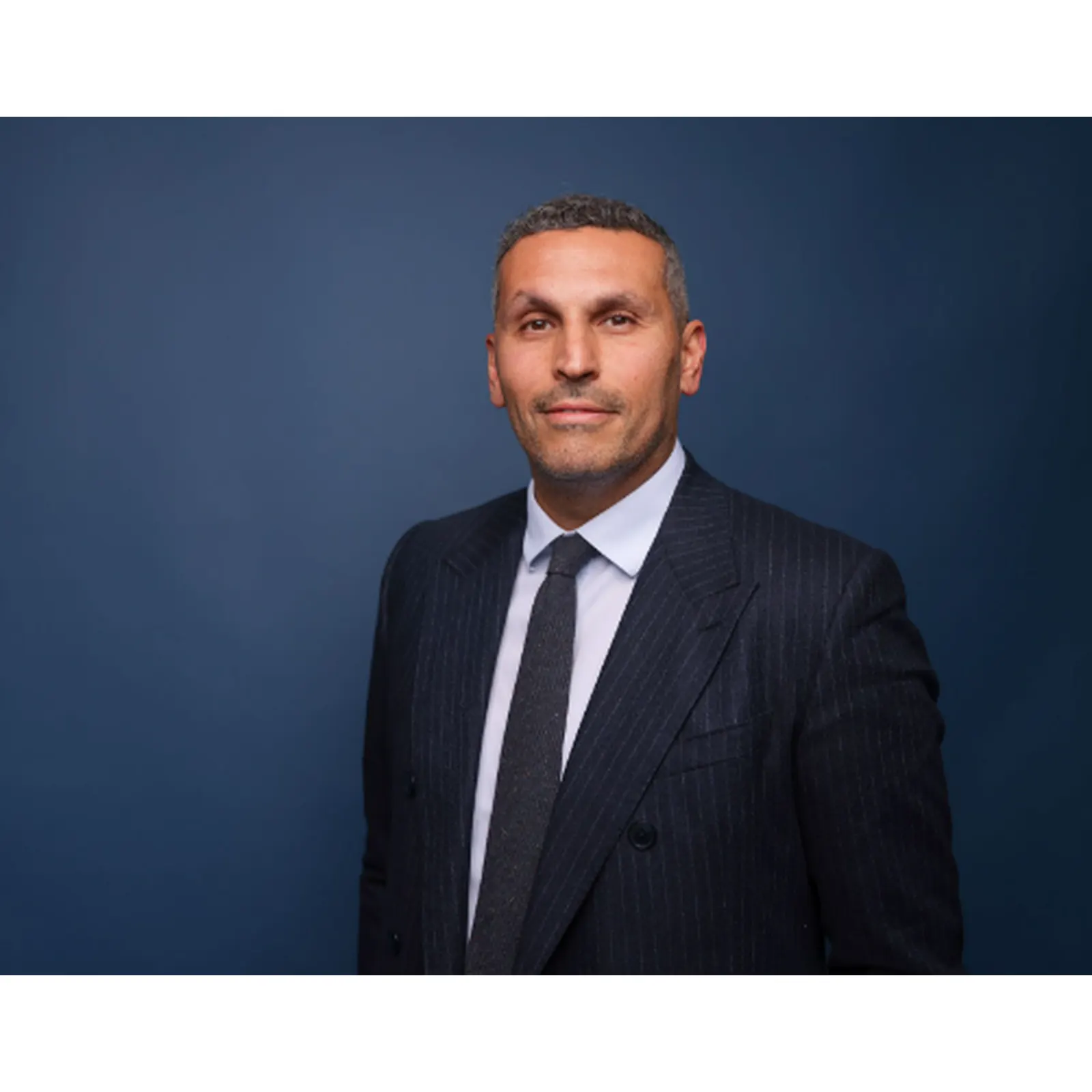 Khaldoon Al Mubarak speaking at an event